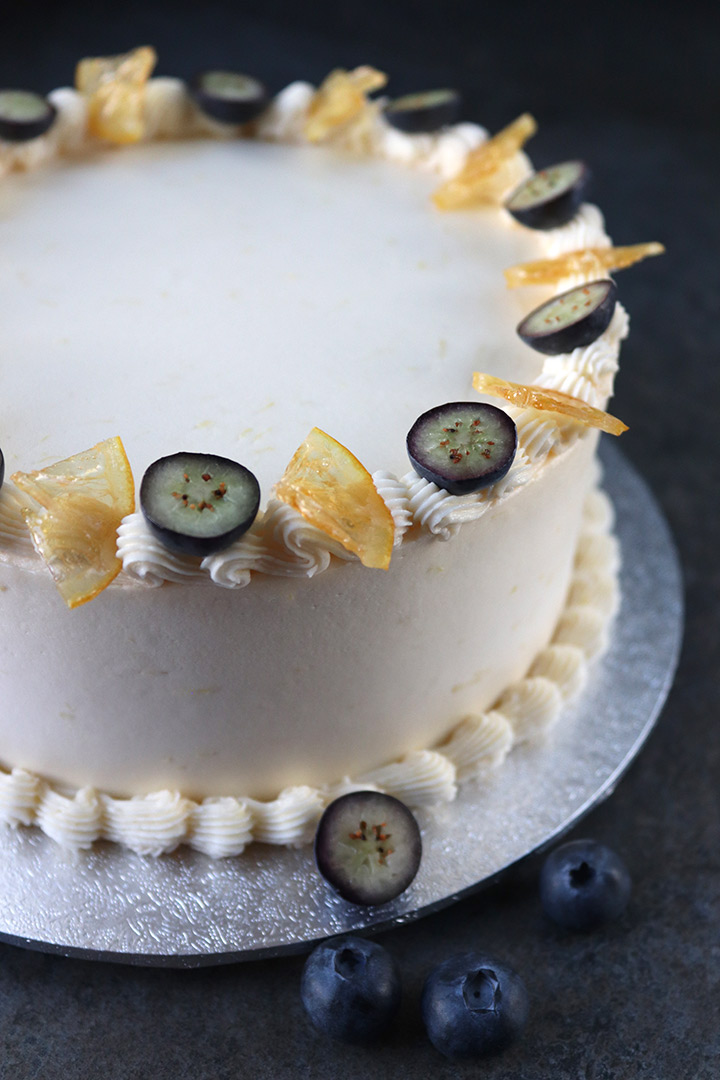Gluten free, dairy free lemon and olive oil cake. Two layers of delicate sponge, filled and frosted with dairy-free lemon buttercream. The cake in the pic is decorated with piped buttercream, candied lemon and fresh blueberries. All ingredients glutenfree and dairyfree