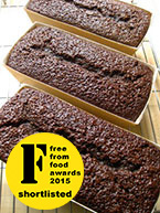 Gluten free, dairy free, nut free Jamaica Ginger Cake: dark and sticky, sweetened with dark muscovado sugar, organic blackstrap molasses and golden syrup and spiced with freshly grated Jamaican root ginger, Jamaican allspice and cinnamon – just like they make it in Jamaica. Made with gluten-free, dairy-free, nut-free ingredients, it's at its best about a week after making and keeps very well. Available plain or with lemon glacé frosting. Can be posted