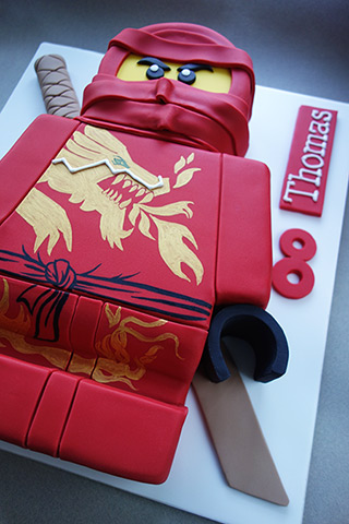 Gluten-free Ninjago Cake: gluten free chocolate cake filled with organic  buttercream and covered with organic marzipan and sugarpaste icing. With handpainted golden dragon motif. All ingredients glutenfree 