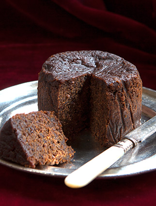 Awarded gold at the Great Taste Awards 2011, this dark, moist, silky-smooth, intensely alcoholic Jamaican fruitcake (gluten-free, dairy-free) is made with organic fruit, finely chopped then soaked in Appleton Kingston 62 Jamaica Rum. Sweetened with organic blackstrap molasses, no added sugar. Gluten free, diary free. No nuts included, but not guaranteed free from nut traces. This delicious fruit cake keeps well and matures with age: perfect for sharing with friends and family. Can be posted to addresses in the UK and abroad and delivered by hand in London